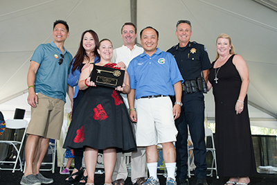Karissa Trinchera receiving the award