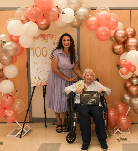 Bernice receiving the award