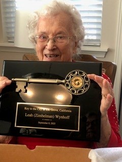 Leah receiving the award