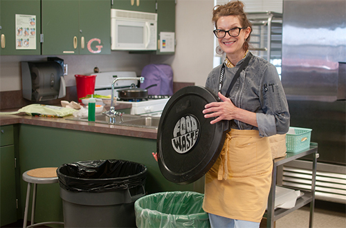 kathleen albiani posing in her classroom